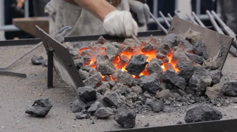 Blacksmith fire. Blacksmith working outdoors. Stock Footage 29440919
