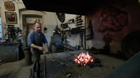 Blacksmith at the forge Stock Footage 67737361