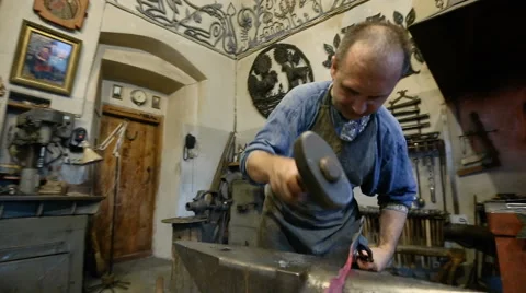Blacksmith at the forge Stock Footage 67739205