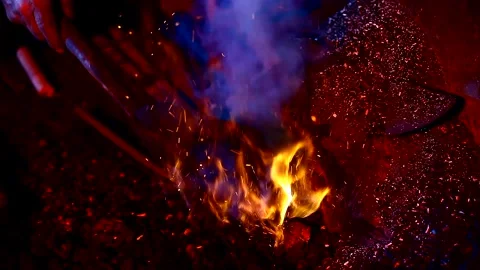 Blacksmith, forge. Old blacksmith working metal with hammer on the anvil. Stock Footage 150734577