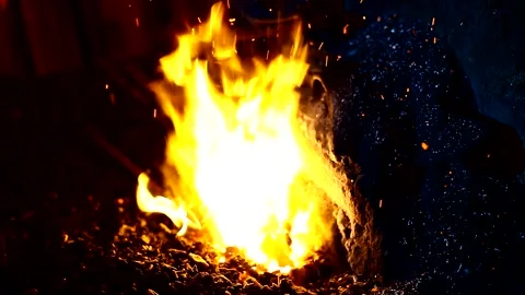 Blacksmith, forge. Old blacksmith working metal with hammer on the anvil. Stock Footage 150734992