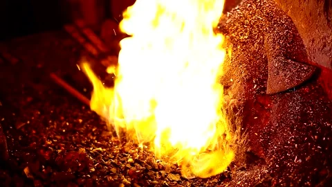 Blacksmith, forge. Old blacksmith working metal with hammer on the anvil. Stock Footage 150735224