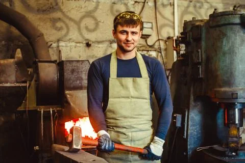 The blacksmith is at the forge Photos
