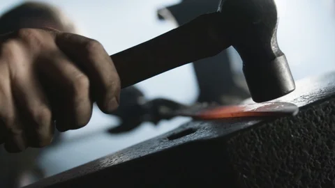 Blacksmith forge welding a hot steel knife with a hammer 스톡 동영상 92058830