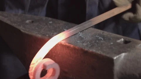 Blacksmith forges iron in fire - Кузня. Ковка металла. Металл в огне 스톡 동영상 104177906