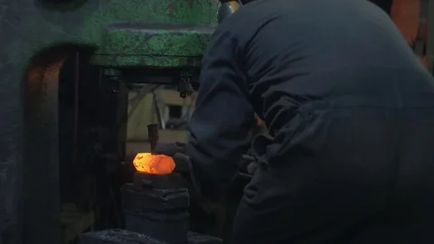 Blacksmith forges iron machine Stock Footage 72694602