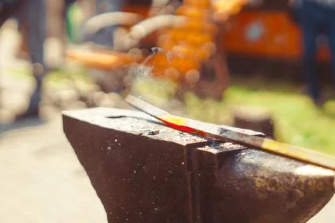 Blacksmith forges iron Stock Photos