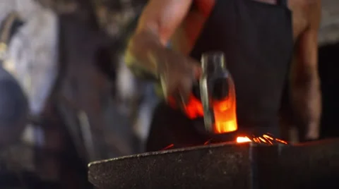 Blacksmith forges metal Stock Footage 44448375