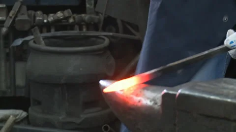 Blacksmith forges metal Stock Footage 53236686