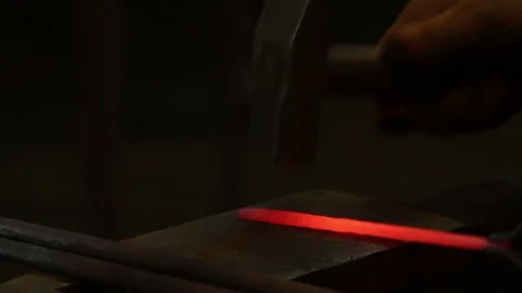 Blacksmith forges metal Stock Footage 72218486
