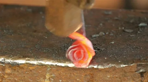 Blacksmith forges rose of nail, 4k 5 Stock Footage 49691919
