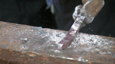 Blacksmith forges a sword Stock Footage 97498