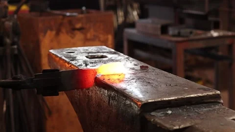 Blacksmith forging at the anvil Stock Footage 143168550