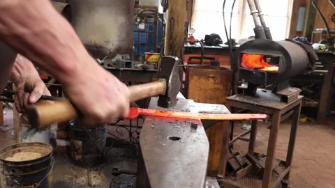Blacksmith forging at the anvil Stock Footage 158583053