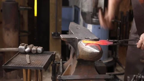Blacksmith forging on anvil horn Stock Footage 160301888