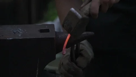 Blacksmith Forging a fire for heating metal, slow motion Stock Footage 92474760