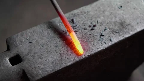 Blacksmith forging hot metal Stock Footage 245263161