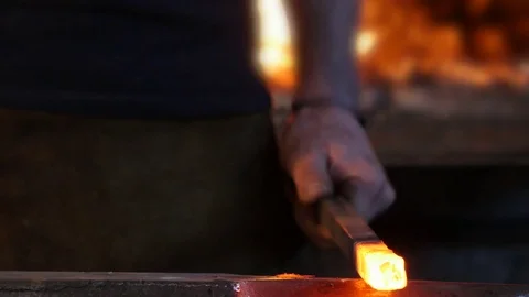 Blacksmith Forging Iron on an Anvil Stock Footage 81548890