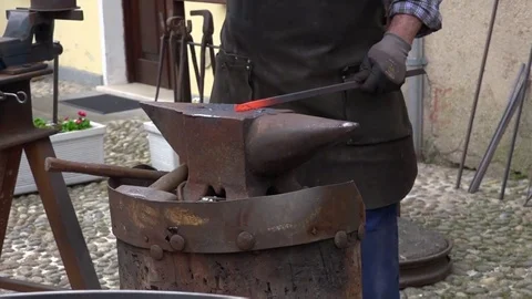 Blacksmith forging iron avil. Stock Footage 70373919