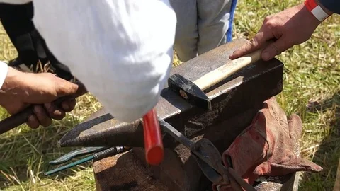 Blacksmith forging metal Stock Footage 78984025
