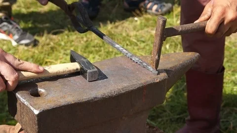 Blacksmith forging metal Stock Footage 78984060