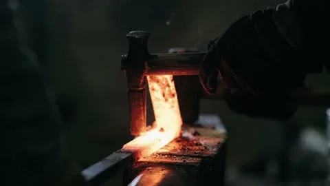 Blacksmith Forging Red-hot Blade of Knife in Smithy. Stock Footage 143152140