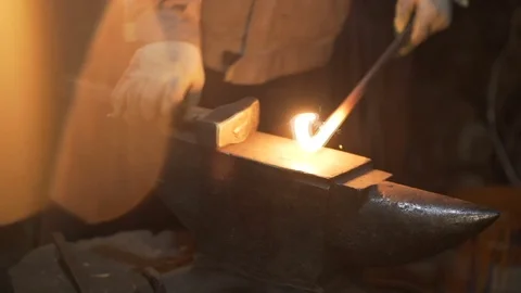 Blacksmith Forging with Sparks in a Workshop Stock Footage 73352534
