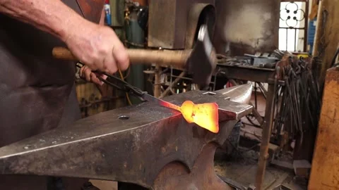Blacksmith forging a spatula at the anvil Stock Footage 160301751