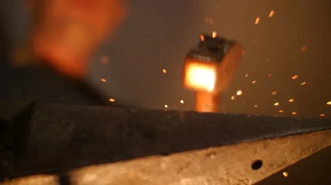 Blacksmith Forging Sword on an Anvil Low Angle Slow Motion 库存影片 55449131