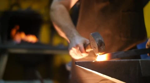 Blacksmith Forging Sword with Sparks in a Workshop Slow Motion Vidéo 55449194