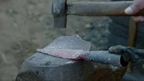 The blacksmith is forging weapons Stock Footage 276518593
