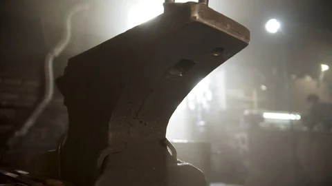 Blacksmith forging workshop with low lighting Stock Footage 125364022