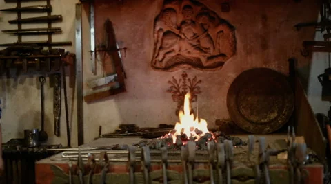 Blacksmith gets out of the oven molten metal Video stock 67696294