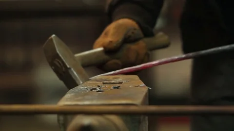 Blacksmith hammering on anvil Stock Footage 72219826
