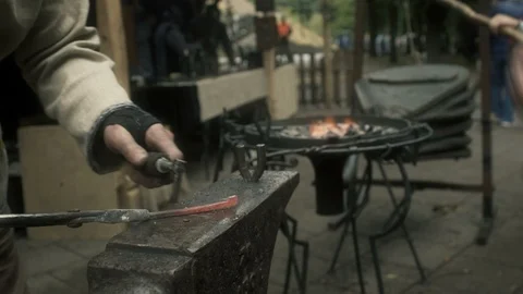 Blacksmith Hammering on a Horseshoe Stock Footage 94254143