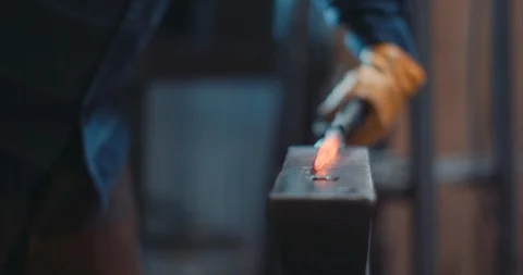 Blacksmith hammering iron Stock Footage 105295510