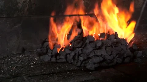 Blacksmith heat metal Stock Footage 2205776
