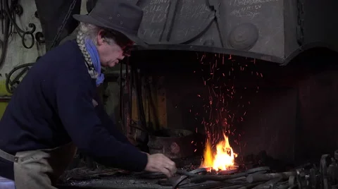 Blacksmith in his workshop Video stock 58145524