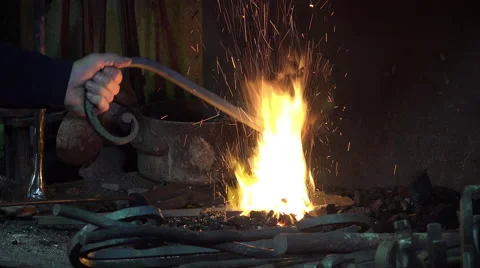 Blacksmith in his workshop Video stock 58145609