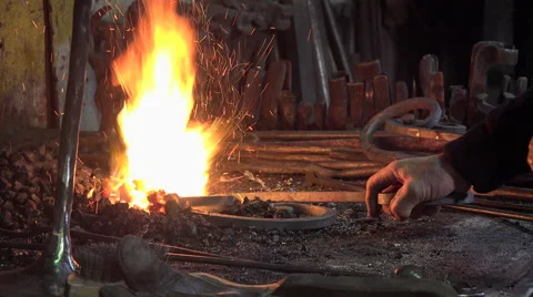 Blacksmith in his workshop Video stock 58146986
