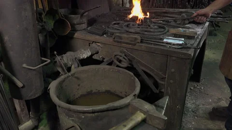 Blacksmith in his workshop Video stock 58155062