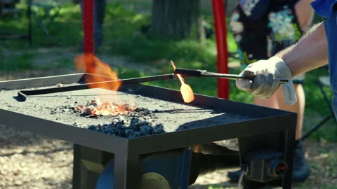 Blacksmith Holding Metal In Forge Embers Stock Footage 341575481