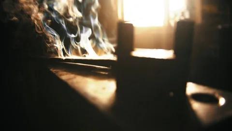 A blacksmith instrument lying on the anvil covered in flame Stock Footage 125364739