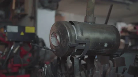 Blacksmith lights a fire in the forge. Damascus steel knife.Blacksmith lights Stock Footage 194485948