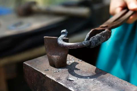 Blacksmith makes a horseshoe  close-up Stock Photos