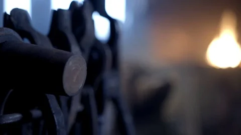 The blacksmith makes a horseshoe in the forge. Hand made, rare old profession Video stock 72347725