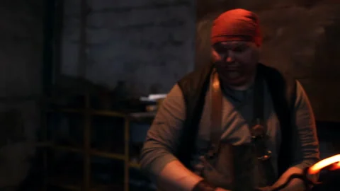 Blacksmith makes a horseshoes in the forge 스톡 동영상 99649962