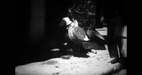 Blacksmith making bucket out of metal Stock Footage 43442620