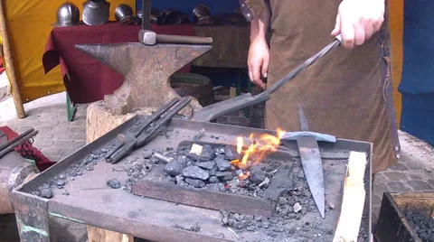 Blacksmith. Medieval tradition. Stock Footage 32710489