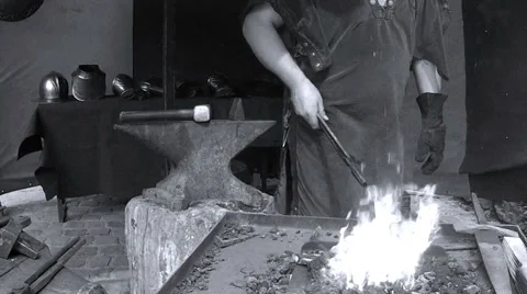 Blacksmith. Medieval tradition. Stock Footage 32712536